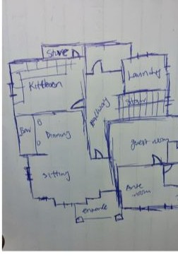 Hand-drawn floor plan sketch before CAD conversion